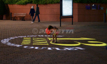 Projection of logos on floors and sidewalks